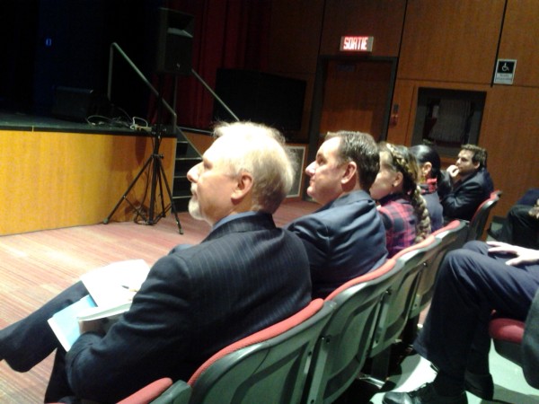Jean-François Lisée sitting next to Jean-François Parenteau at the Verdun Aquatic Centre funding announcement