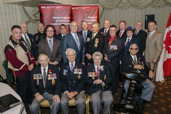 Vera Sherlock: first row in front, third from the left Sébastien Vincent: second row, second from the left (left of Minister Fantino) Photo credit: Veterans Affairs Canada